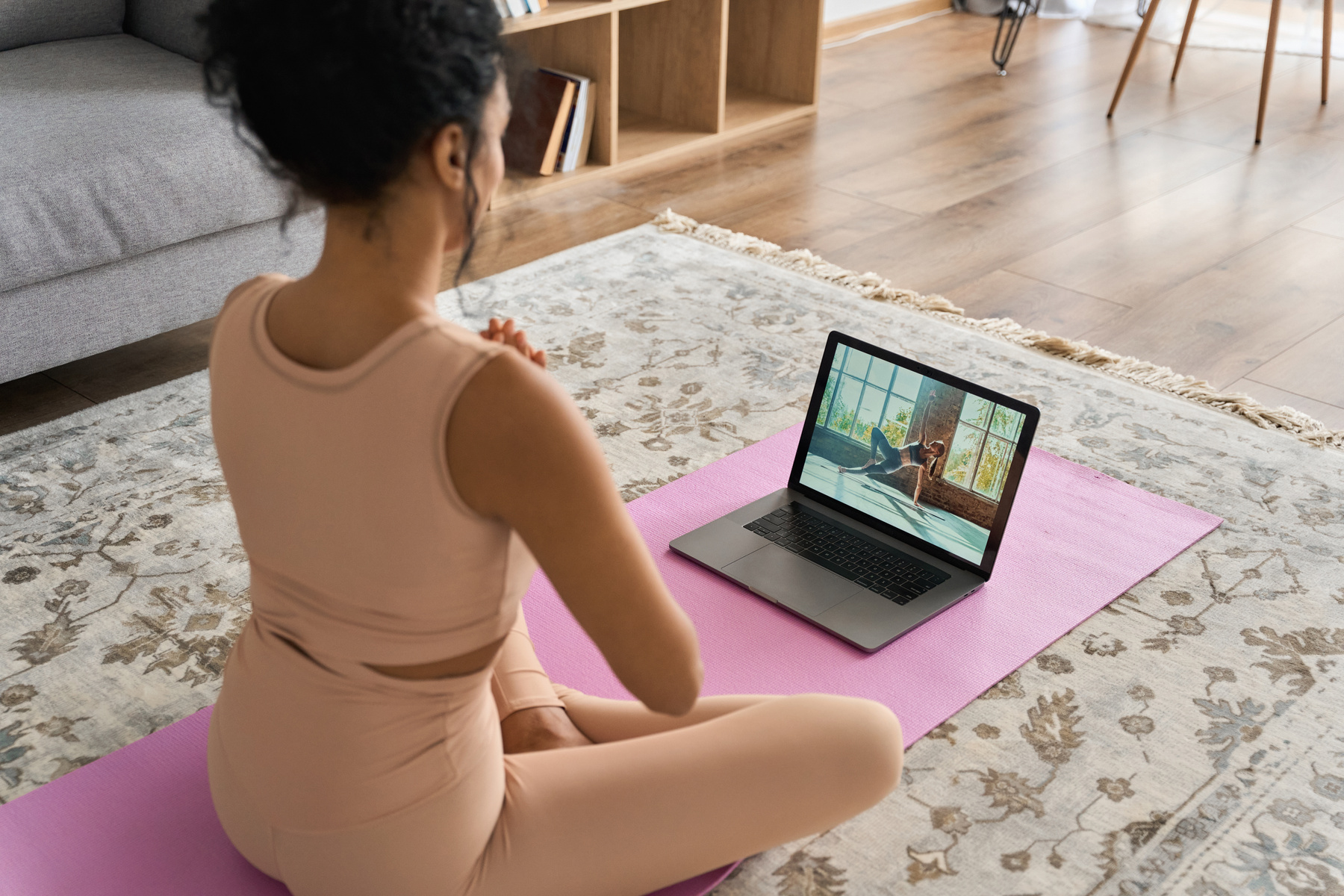 Person Watching Online Yoga Tutorial